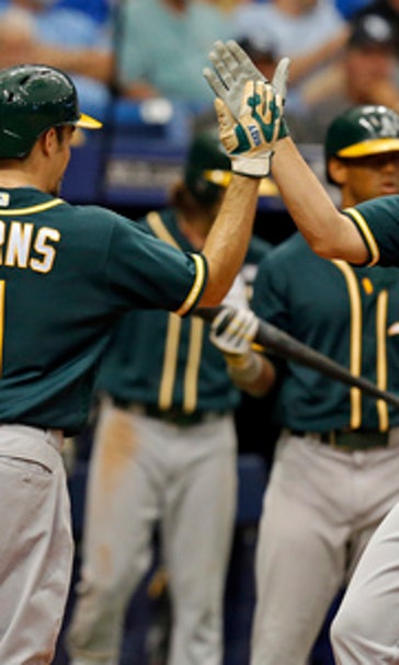 Valencia homers 3 times as A's beat Rays 7-6